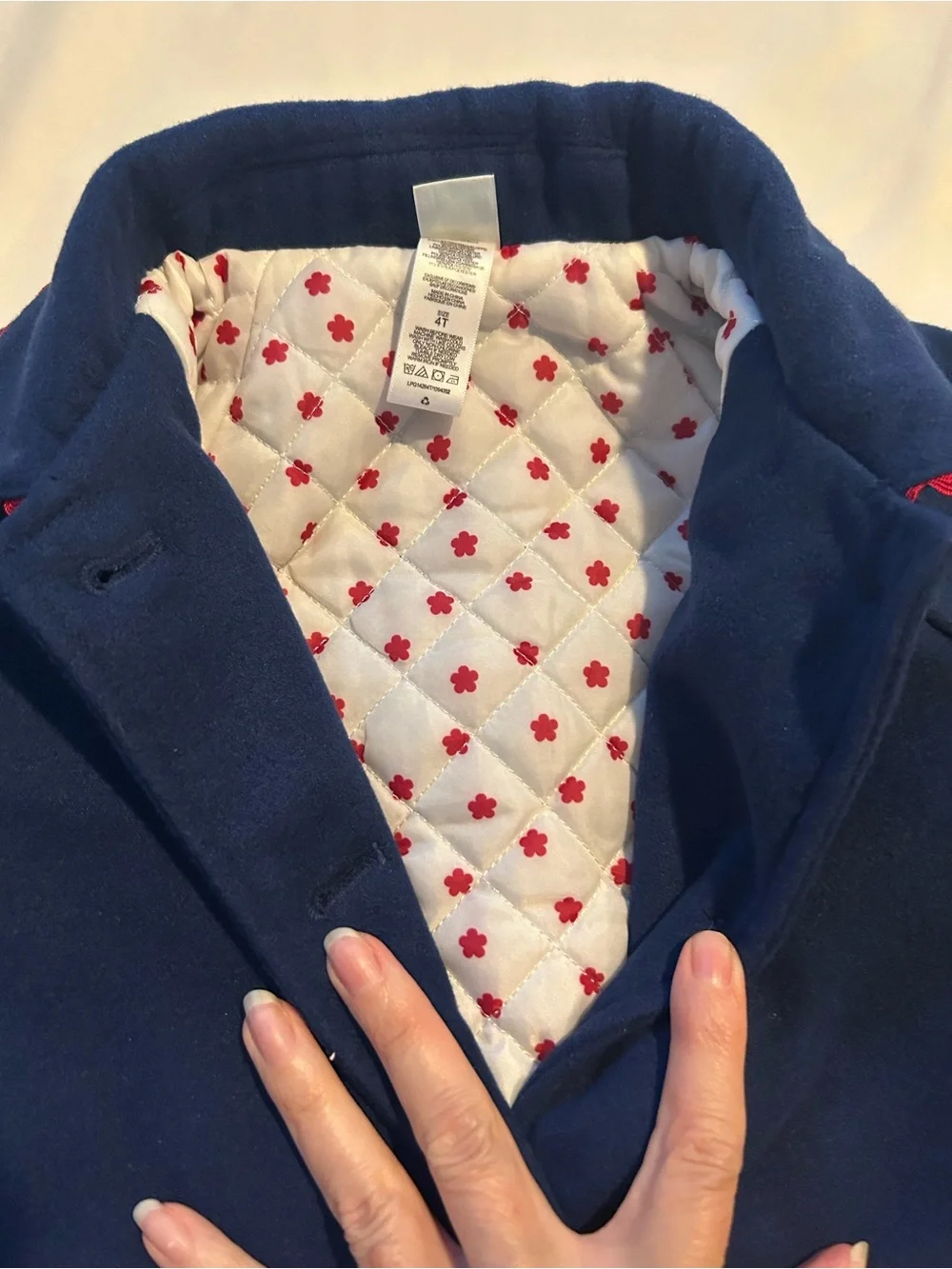 Little Me Navy Pea Coat with Red Scallop Trim and Bow.
